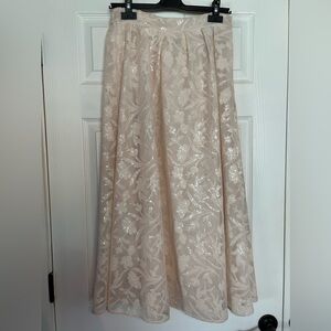 Gorgeous Cream sequined skirt. No lining.
NOT SOLD!